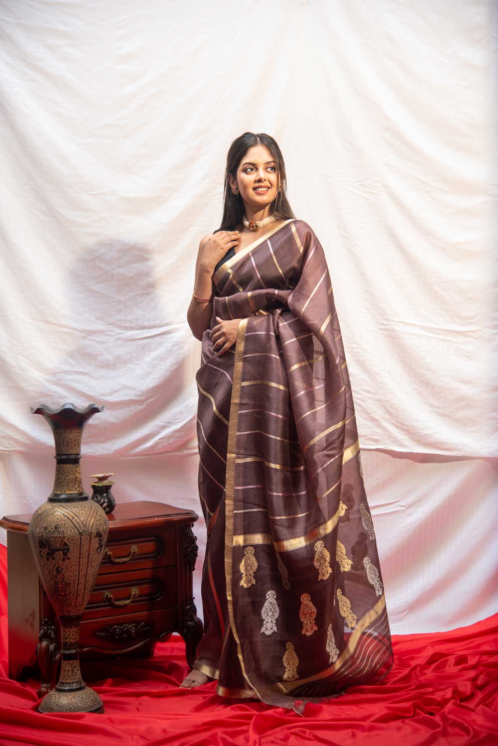 Coffee Brown Pure Organza Silk Banarasi Handloom Saree With Kadhua Striped Body And Sleak Gold Zari Border Coffee Brown Pure Organza Silk Banarasi Handloom Saree With Kadhua Striped Body And Sleak Gold Zari Border