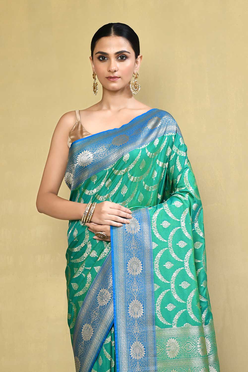 Green- Blue Banarasi Saree With Handwoven Jaal Pattern Green- Blue Banarasi Saree With Handwoven Jaal Pattern