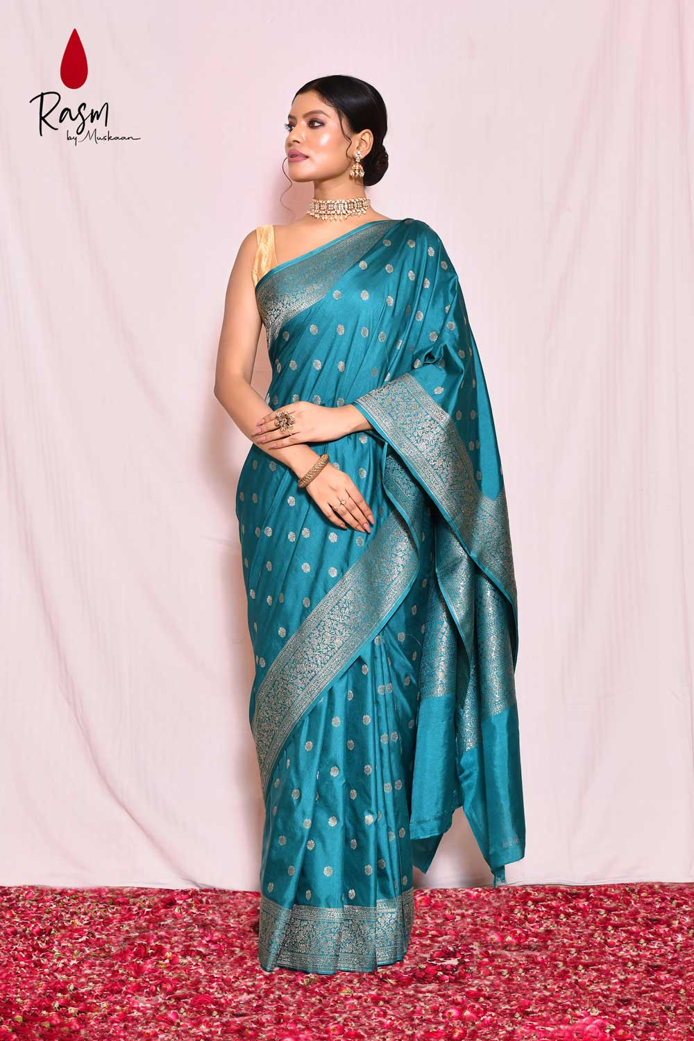 Teal Mushru Satin Banarasi Handloom Saree With Handwoven Silver Booti Teal Mushru Satin Banarasi Handloom Saree With Handwoven Silver Booti