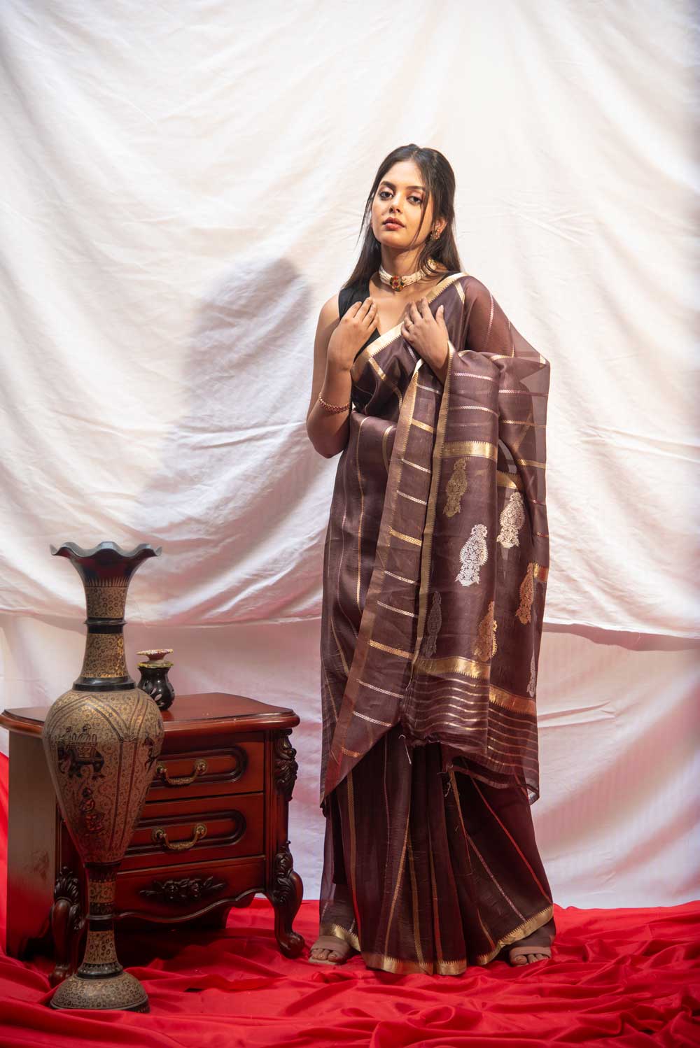 Coffee Brown Pure Organza Silk Banarasi Handloom Saree With Kadhua Striped Body And Sleak Gold Zari Border Coffee Brown Pure Organza Silk Banarasi Handloom Saree With Kadhua Striped Body And Sleak Gold Zari Border