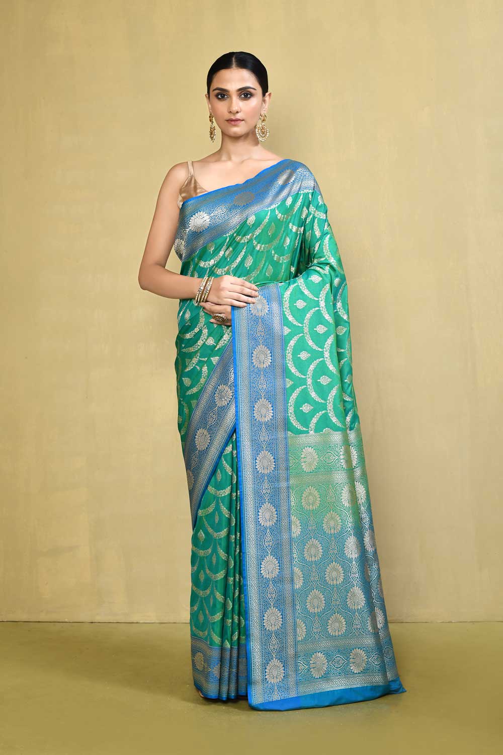 Green- Blue Banarasi Handloom Saree With Handwoven Jaal Pattern Green- Blue Banarasi Handloom Saree With Handwoven Jaal Pattern