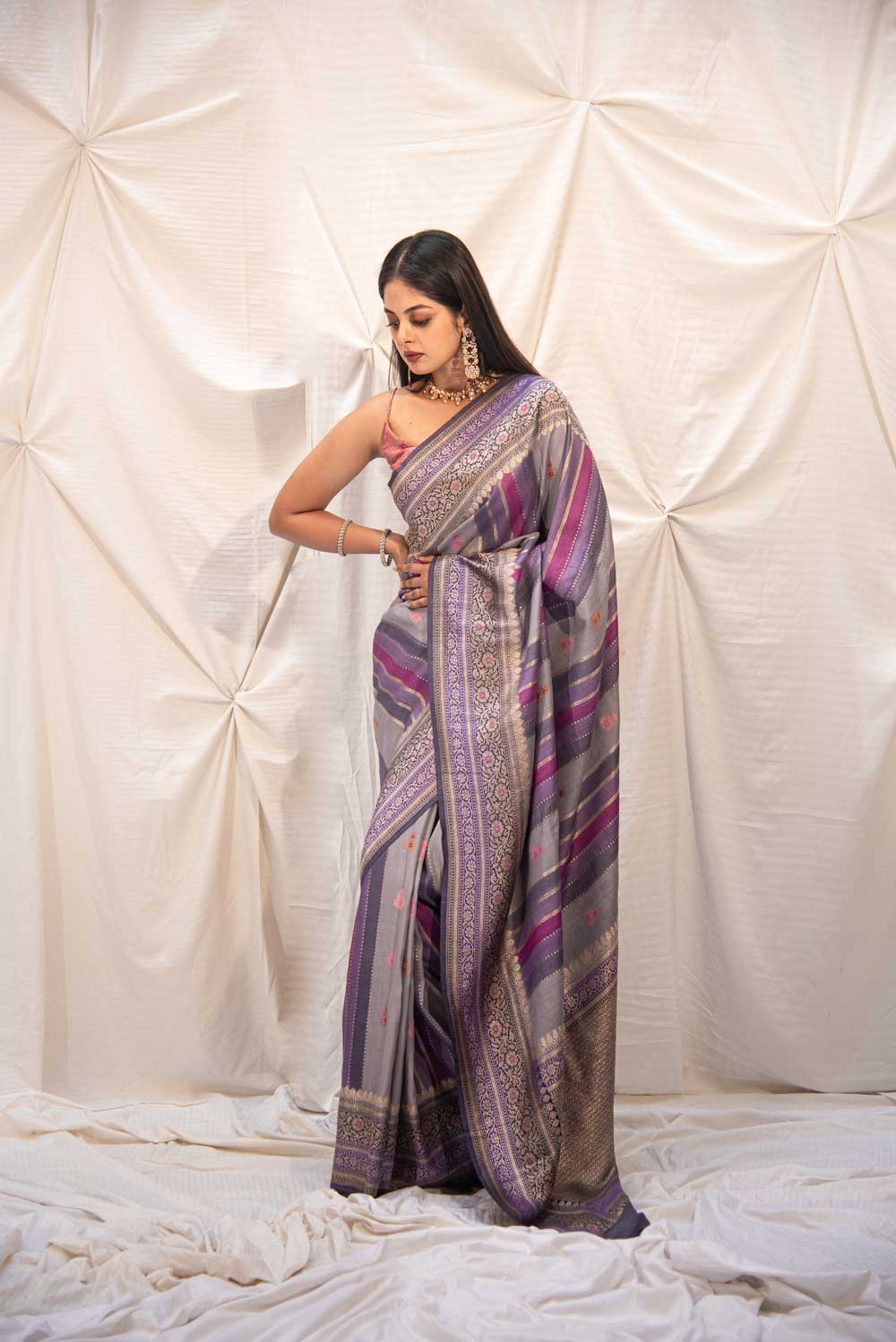 Rangkat Pure Tussar Georgette Banarasi Handloom Silk Saree With Stripe-Patterned Body- Kadhua Boota And Meenakari Border Rangkat Pure Tussar Georgette Banarasi Handloom Silk Saree With Stripe-Patterned Body- Kadhua Boota And Meenakari Border