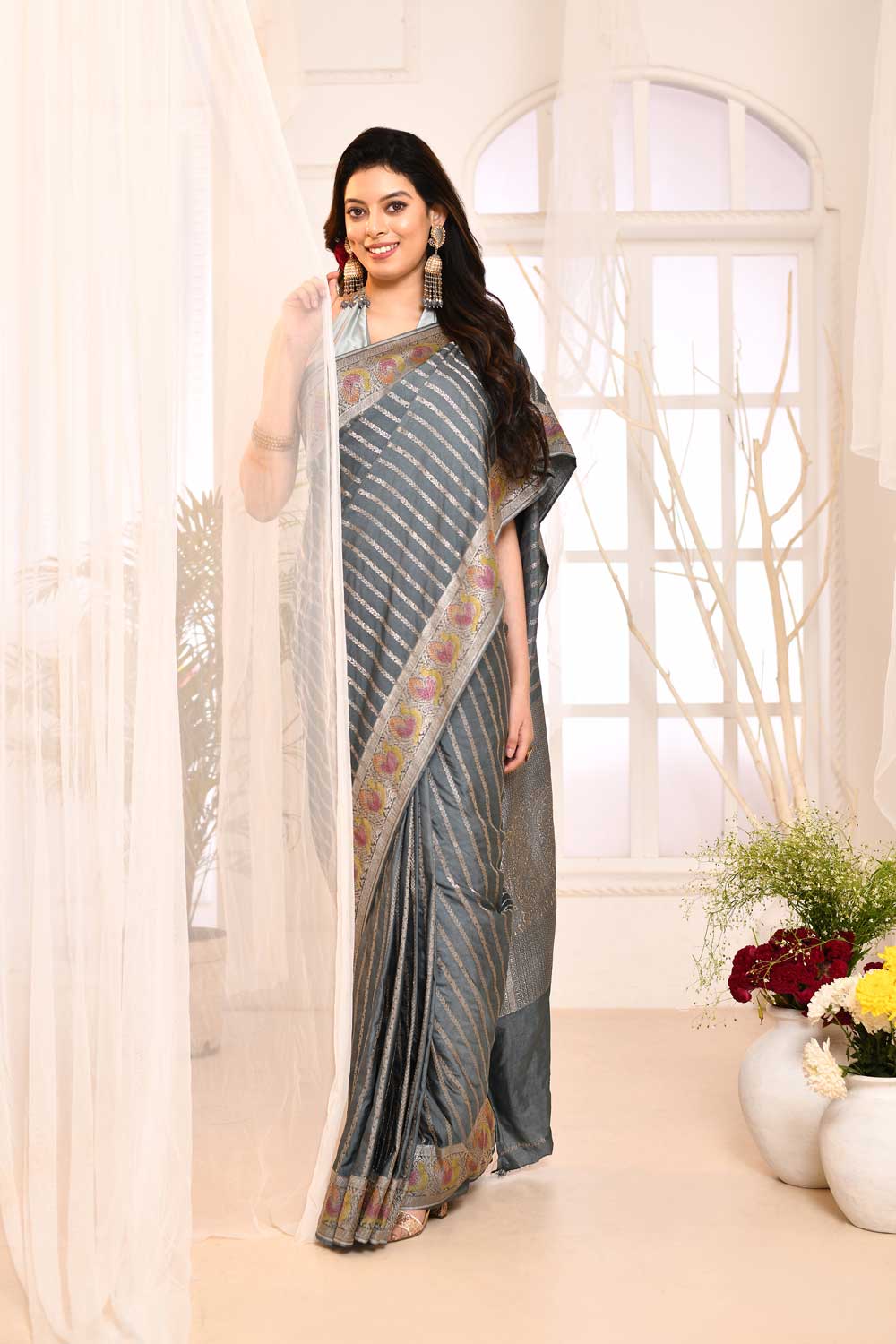 Grey Mushru Satin Banarasi Handloom Saree With Stripe Patterned Design And Meenakari Border Grey Mushru Satin Banarasi Handloom Saree With Stripe Patterned Design And Meenakari Border