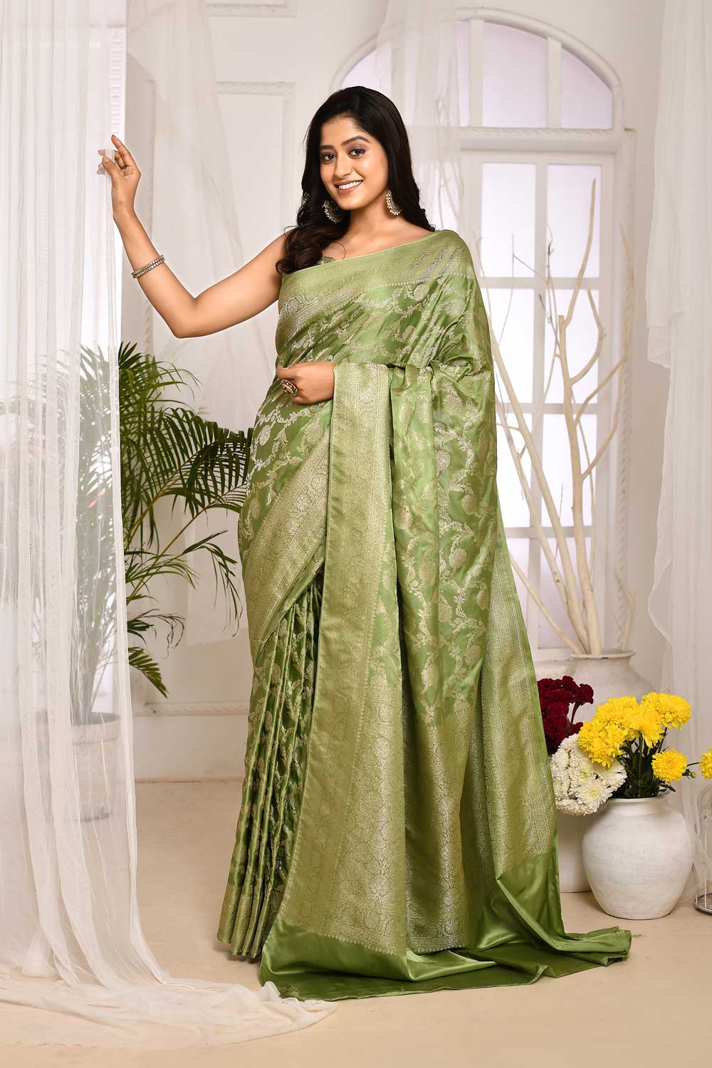 Pastel Green Mushru Satin Banarasi Handloom Saree With All Over Jaal In Silver Zari Pastel Green Mushru Satin Banarasi Handloom Saree With All Over Jaal In Silver Zari