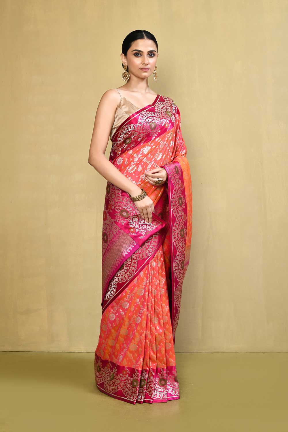 Orange- Peach Pink Banarasi Handloom saree with Contrast Meenakari Border Orange- Peach Pink Banarasi Handloom saree with Contrast Meenakari Border