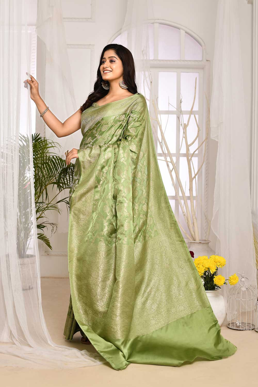 Pastel Green Mushru Satin Banarasi Handloom Saree With All Over Jaal In Silver Zari Pastel Green Mushru Satin Banarasi Handloom Saree With All Over Jaal In Silver Zari