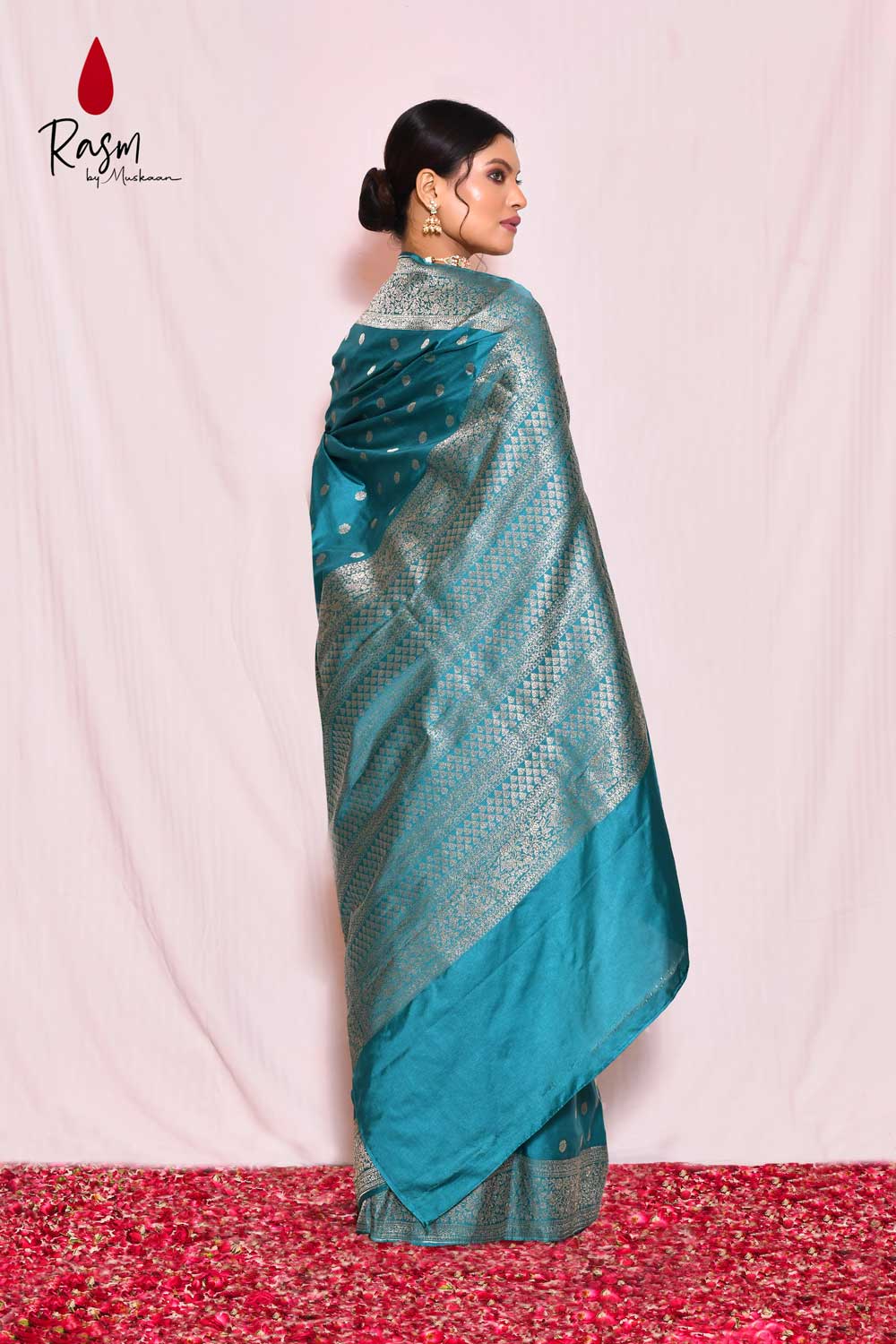 Teal Mushru Satin Banarasi Handloom Saree With Handwoven Silver Booti Teal Mushru Satin Banarasi Handloom Saree With Handwoven Silver Booti