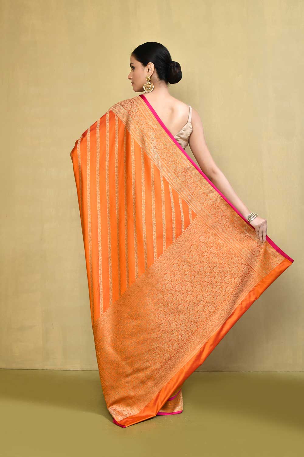 Orange Banarasi Handloom Saree With contemporary adda stripe pattern Design Orange Banarasi Handloom Saree With contemporary adda stripe pattern Design