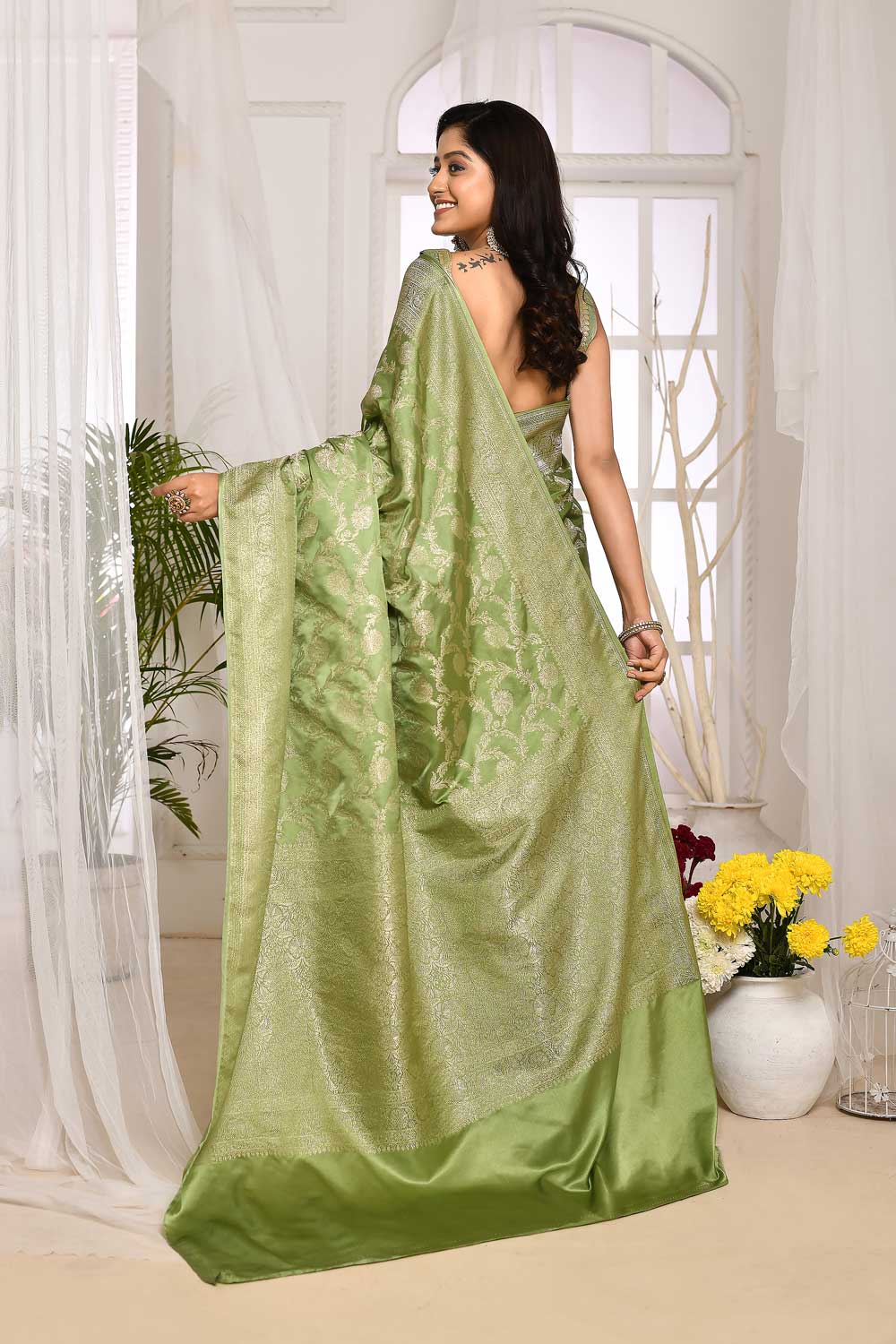 Pastel Green Mushru Satin Banarasi Handloom Saree With All Over Jaal In Silver Zari Pastel Green Mushru Satin Banarasi Handloom Saree With All Over Jaal In Silver Zari