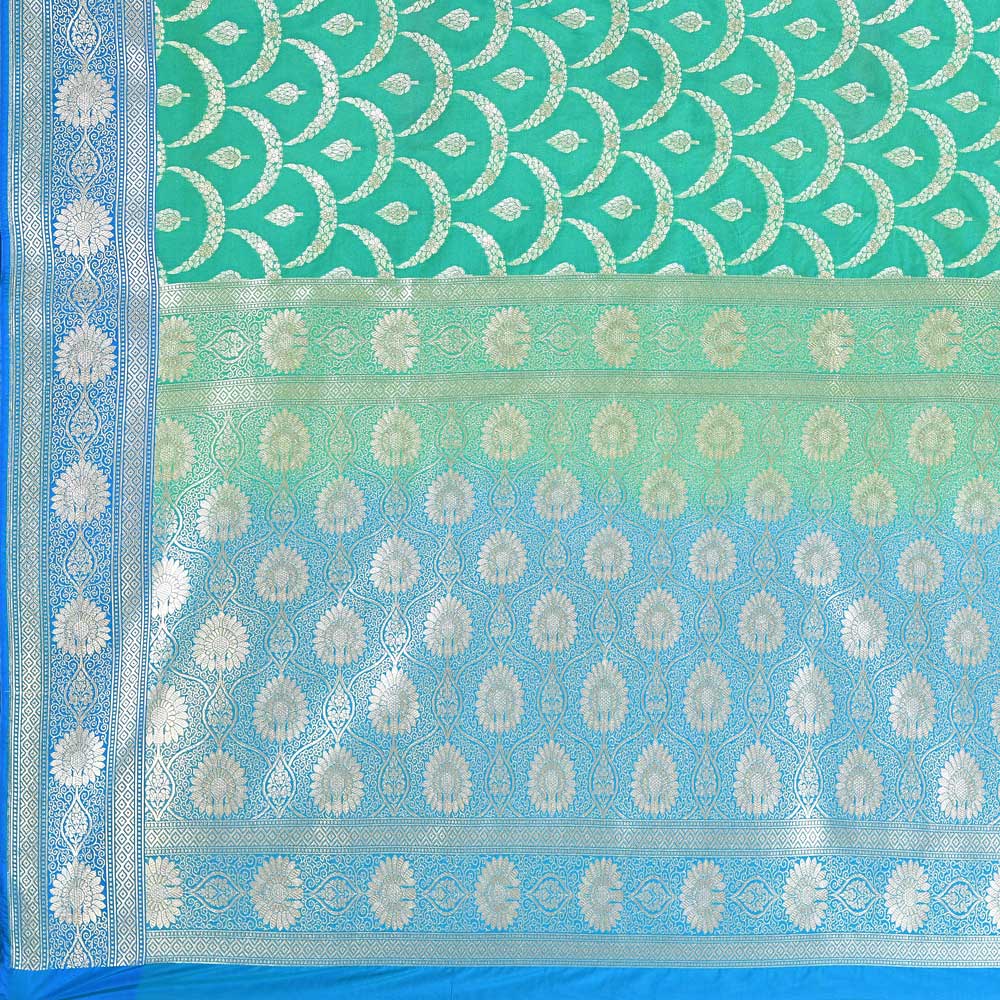 Green- Blue Banarasi Handloom Saree With Handwoven Jaal Work Green- Blue Banarasi Handloom Saree With Handwoven Jaal Work