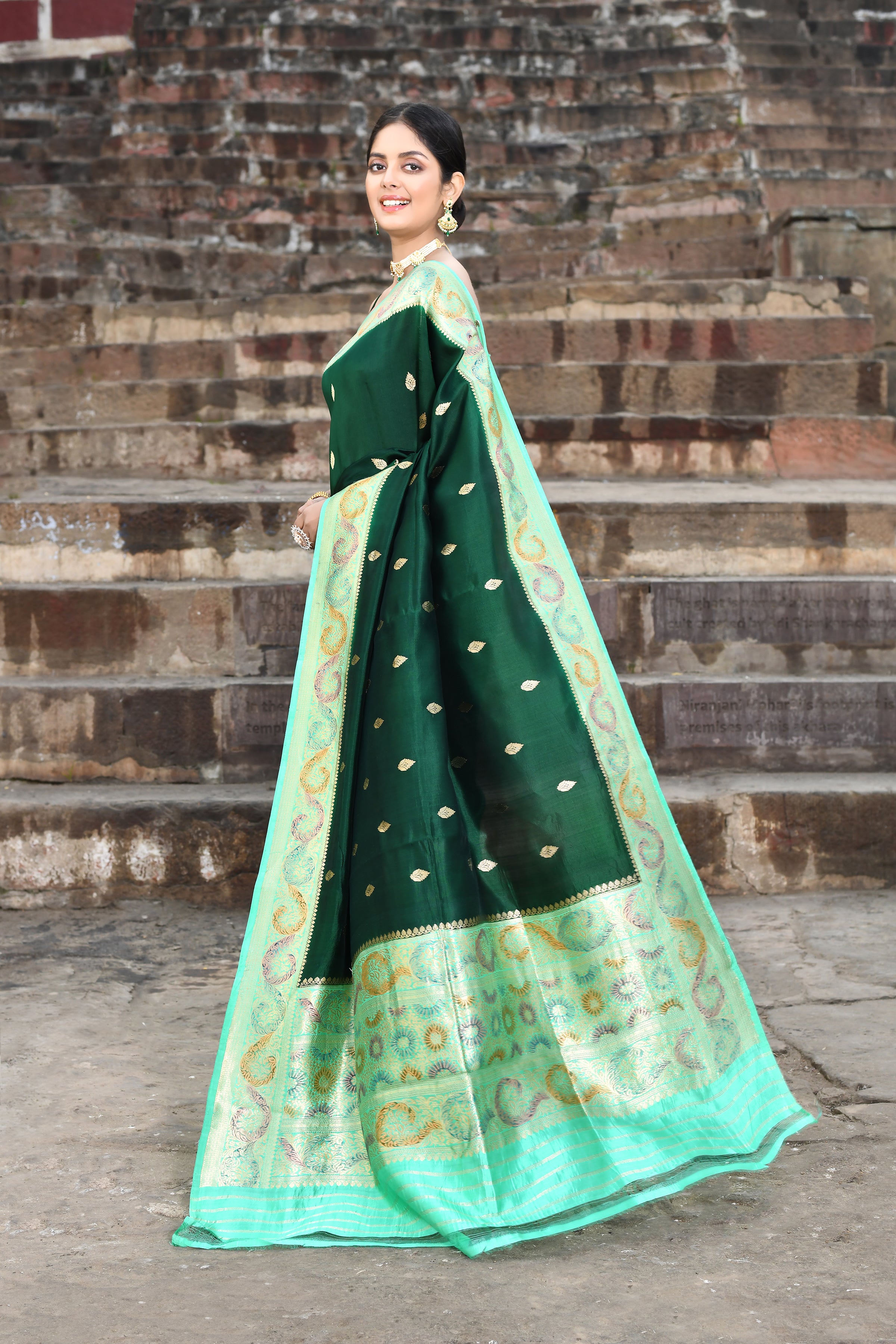 Bottle Green Pure Katan Silk Banarasi Handloom Saree With a Meenakari Border in Sea Green Bottle Green Pure Katan Silk Banarasi Handloom Saree With a Meenakari Border in Sea Green