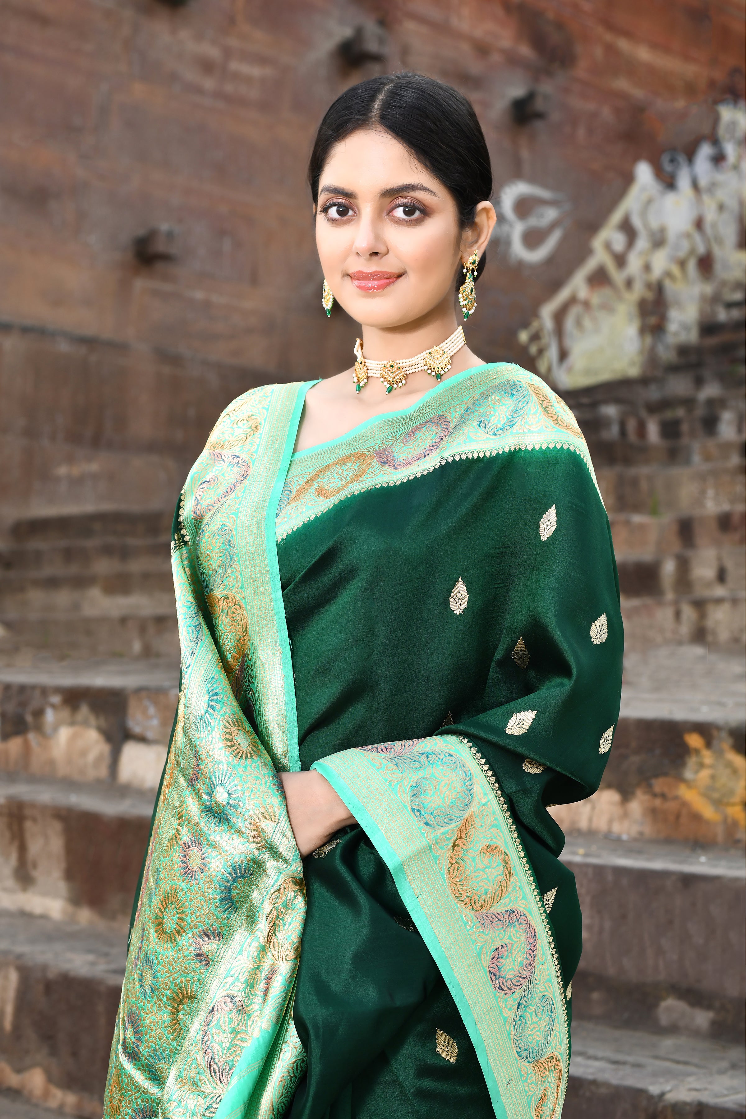 Bottle Green Pure Katan Silk Banarasi Handloom Saree With a Meenakari Border in Sea Green Bottle Green Pure Katan Silk Banarasi Handloom Saree With a Meenakari Border in Sea Green