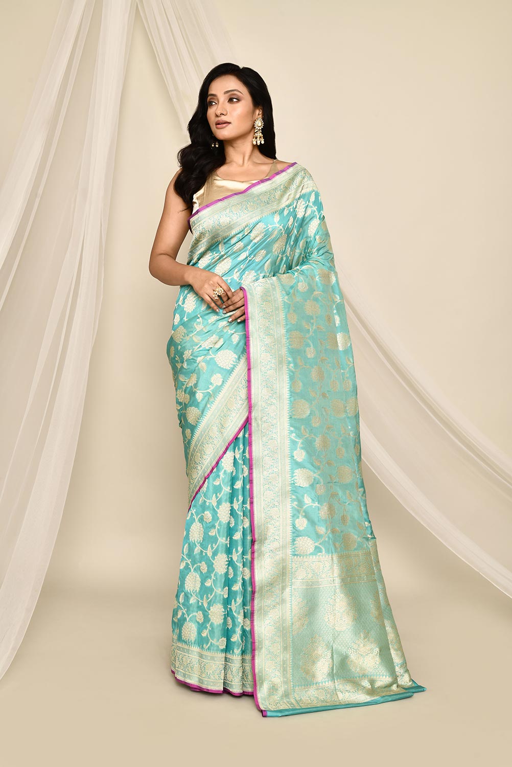 Handloom 'Arctic Blue' Pure Katan Silk Banarasi Handloom Saree with all over Jaal and contrast selvedge Handloom 'Arctic Blue' Pure Katan Silk Banarasi Handloom Saree with all over Jaal and contrast selvedge