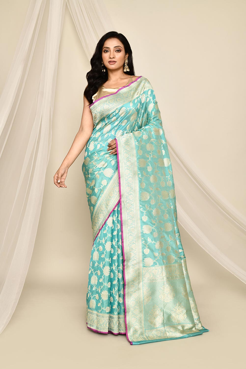 Handloom 'Arctic Blue' Pure Katan Silk Banarasi Handloom Saree with all over Jaal and contrast selvedge Handloom 'Arctic Blue' Pure Katan Silk Banarasi Handloom Saree with all over Jaal and contrast selvedge