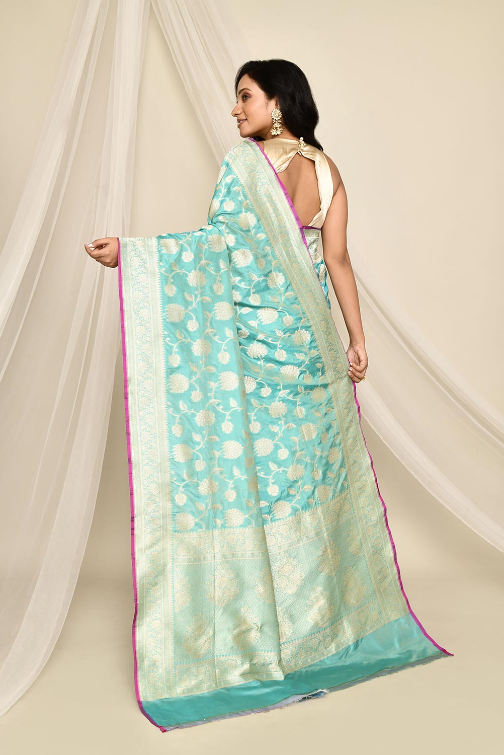 Handloom 'Arctic Blue' Pure Katan Silk Banarasi Handloom Saree with all over Jaal and contrast selvedge Handloom 'Arctic Blue' Pure Katan Silk Banarasi Handloom Saree with all over Jaal and contrast selvedge