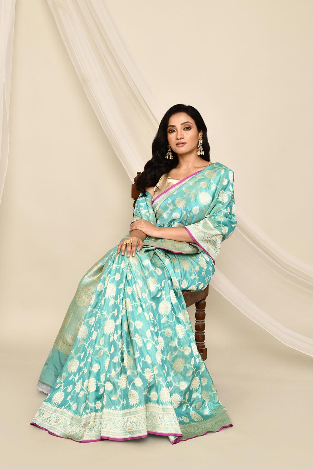 Handloom 'Arctic Blue' Pure Katan Silk Banarasi Handloom Saree with all over Jaal and contrast selvedge Handloom 'Arctic Blue' Pure Katan Silk Banarasi Handloom Saree with all over Jaal and contrast selvedge