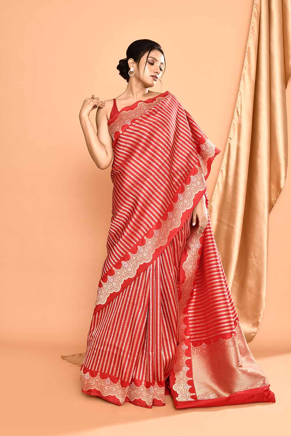 'Modern Brides' Red Pure Katan Silk Banarasi Handloom Saree with Ropa Sona Stripes and Scalloped Meenakari Border 'Modern Brides' Red Pure Katan Silk Banarasi Handloom Saree with Ropa Sona Stripes and Scalloped Meenakari Border
