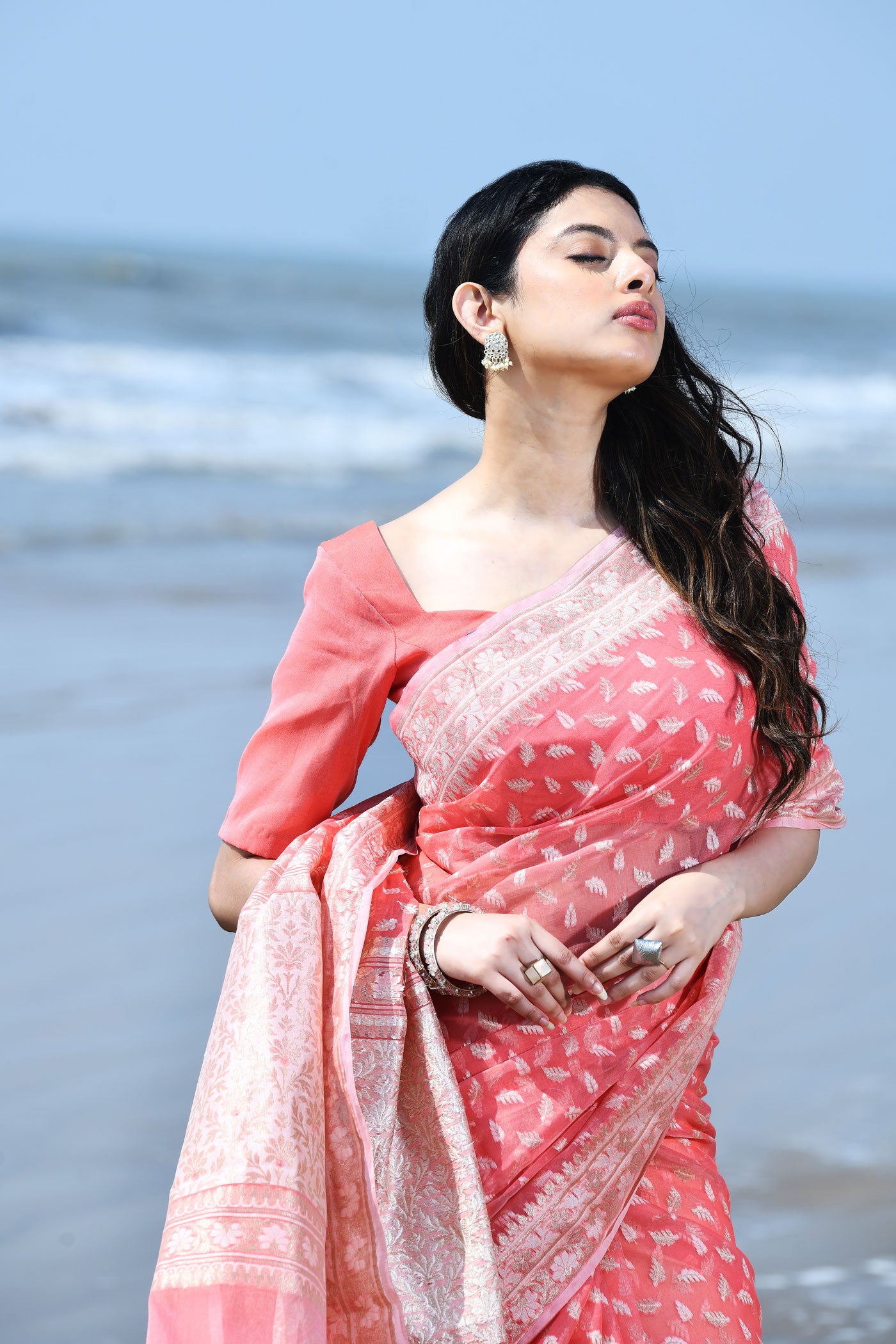 Zehn-e-Gul' Coral Peach Pure Resham Cotton Silk Banarasi Handloom Saree Zehn-e-Gul' Coral Peach Pure Resham Cotton Silk Banarasi Handloom Saree