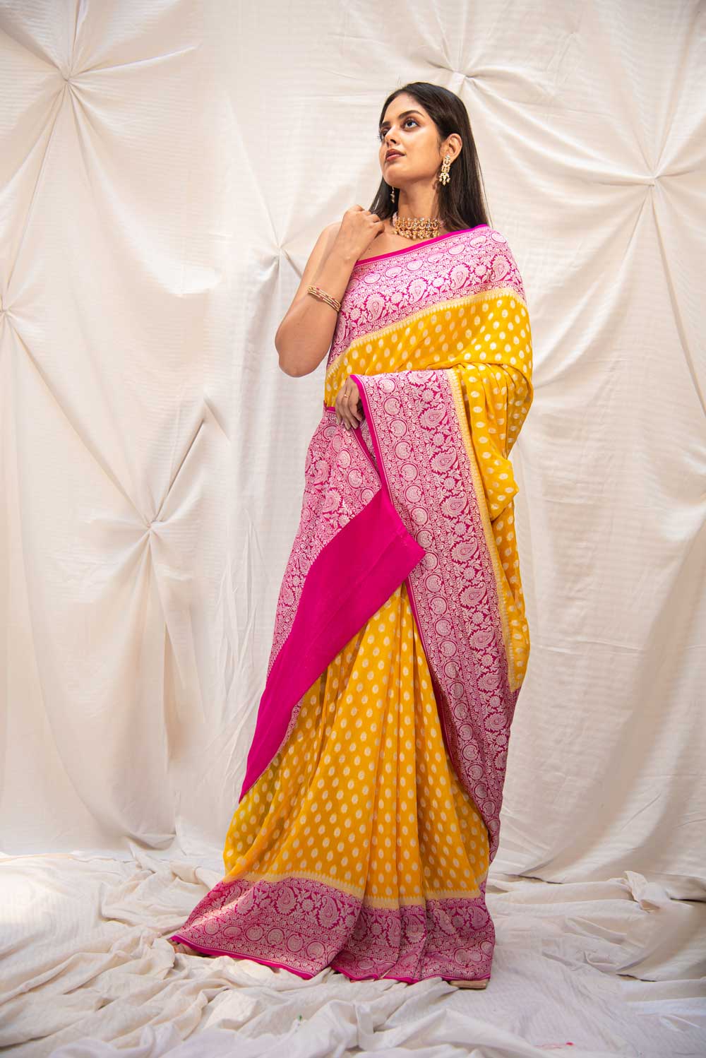 Yellow Pure Khaddi Georgette Silk Banarasi Handloom Saree With Contrast Pink Border Handwoven In Silver Zari