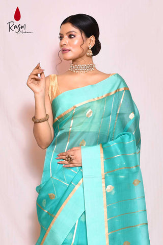 Tourquoise Pure Kora Organza Banarasi Handloom Silk Saree With Golden Striped Body And Kadhua Boota In Gold Zari With Silver Meenakari