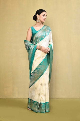 Off- White and Green Banarasi Handloom saree with Contrast Border