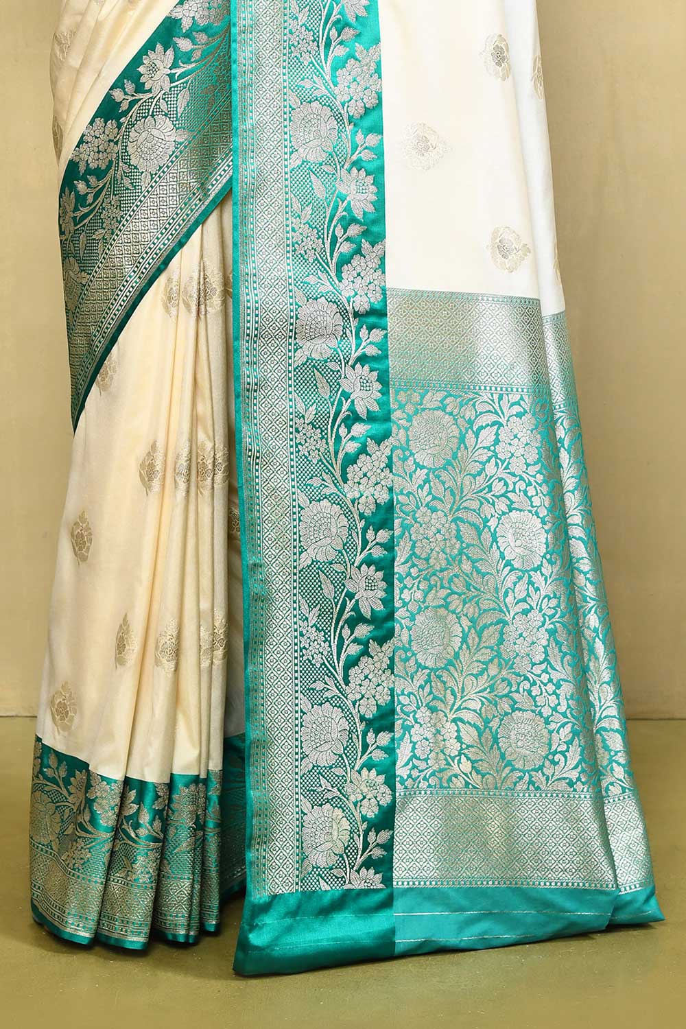 Off- White and Green Banarasi Handloom saree with Contrast Border