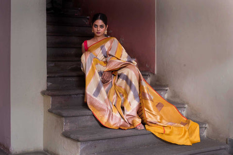 Rangkat Pure Tussar Georgette Banarasi handloom silk saree with stripe-patterned body and Meenakari border