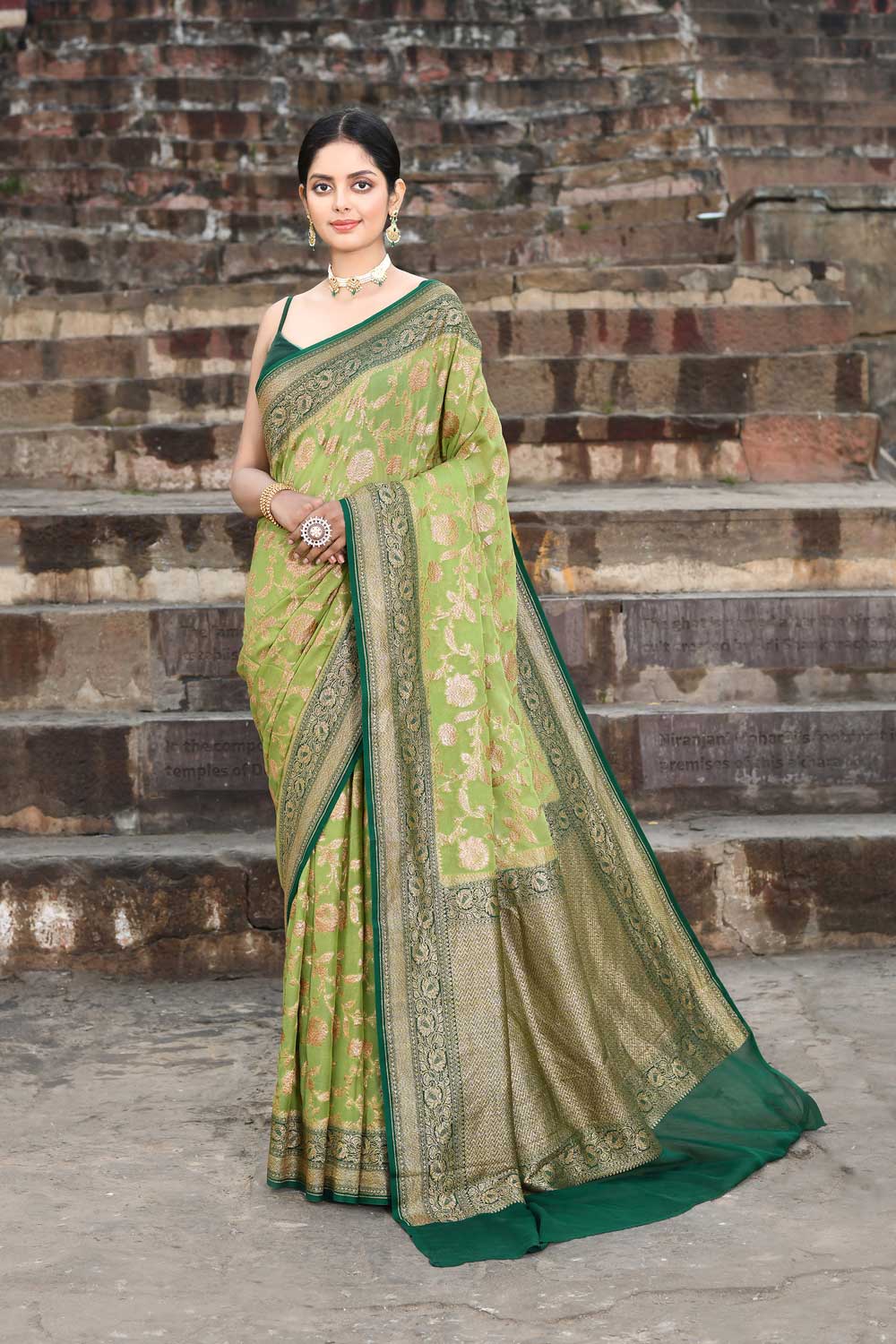 Green Pure Khaddi Georgette Banarasi Handloom Saree With Contrast Border In Dark Green Color