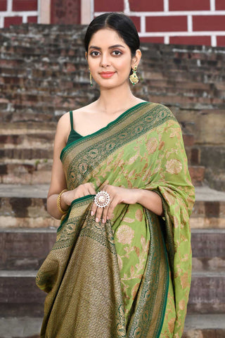 Green Pure Khaddi Georgette Banarasi Saree With Contrast Border In Dark Green Color