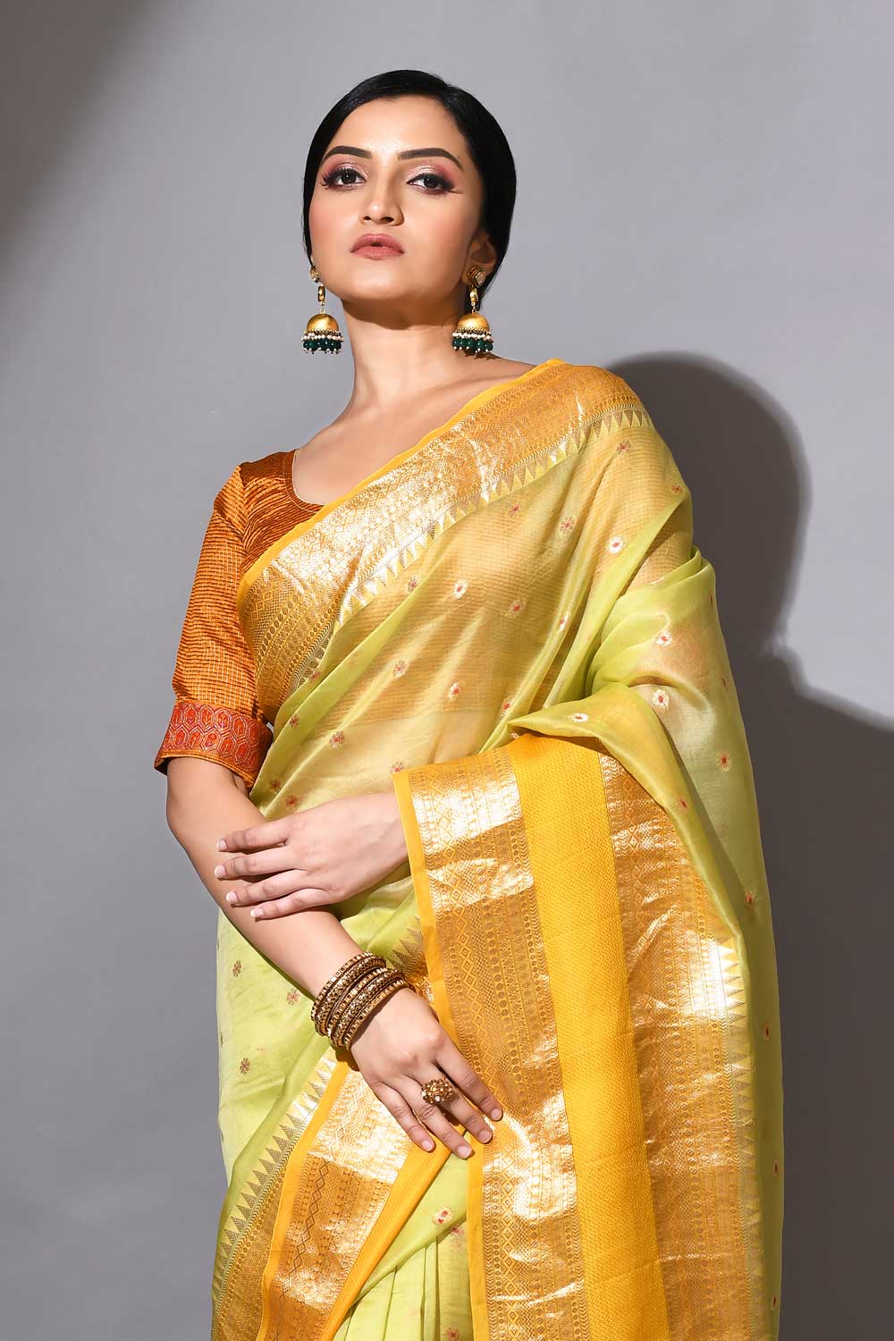 Pista Green Pure Kora Organza Banarasi Handloom Silk Saree With Meenakro Booti And Contrast Yellow Border
